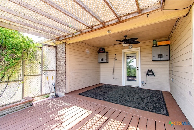 deck with a pergola and ceiling fan