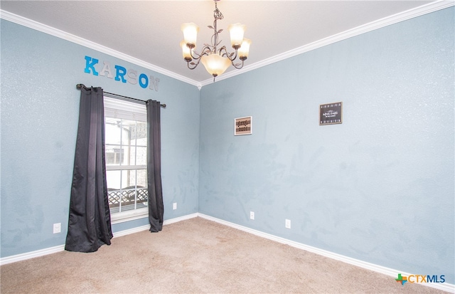 carpeted spare room with ornamental molding and an inviting chandelier