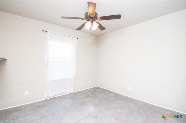 empty room featuring ceiling fan