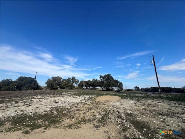 view of yard featuring a rural view