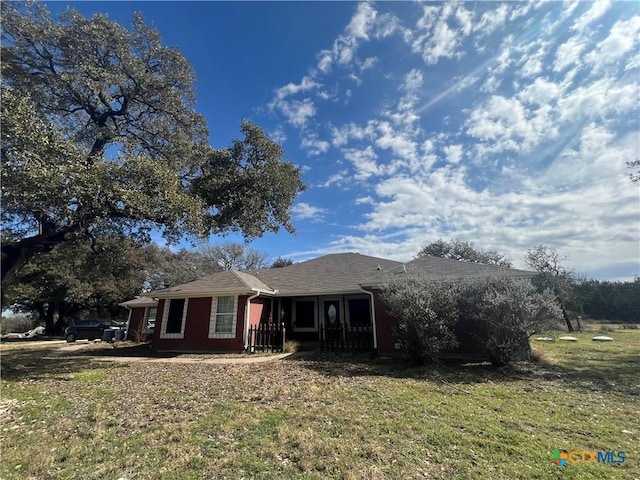 exterior space featuring a front lawn