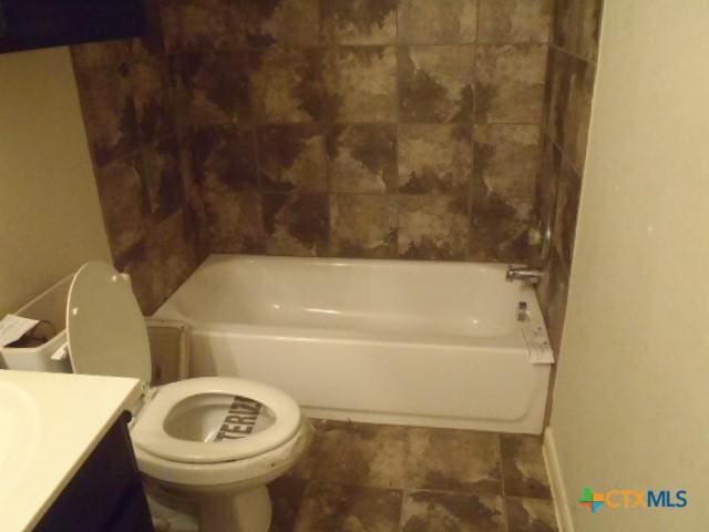 306 Oak Creek Way, New Braunfels, TX 78130 - bathroom with toilet, baseboards, and vanity