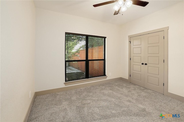 2892 Beulah Blvd, Belton, TX 76513 - carpeted spare room featuring a ceiling fan and baseboards