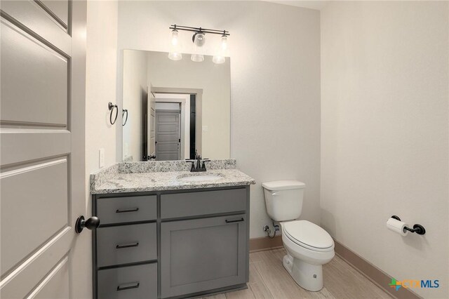 2892 Beulah Blvd, Belton, TX 76513 - half bath featuring baseboards, toilet, and vanity