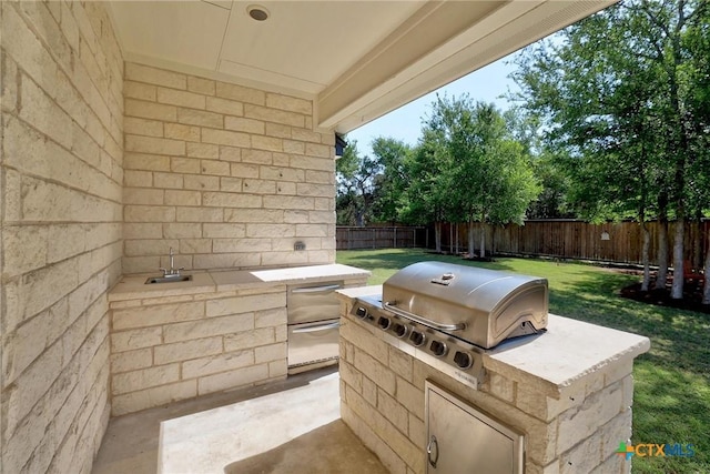 2892 Beulah Blvd, Belton, TX 76513 - view of patio featuring area for grilling, a grill, and a sink