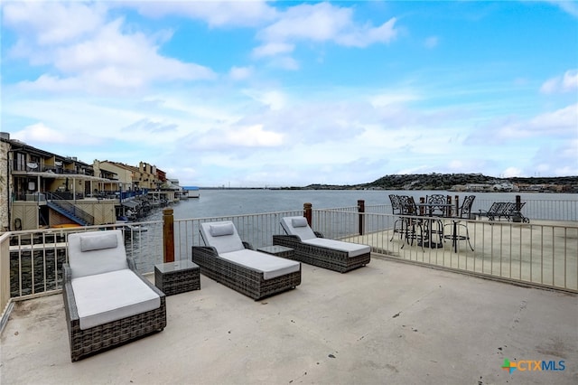 view of patio / terrace featuring a water view