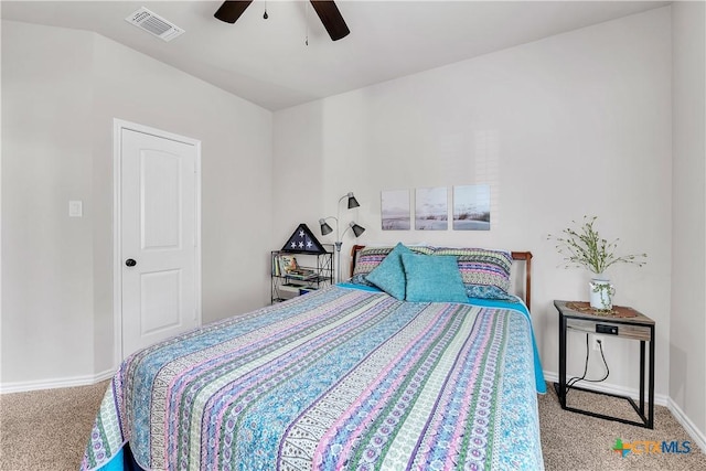 bedroom featuring light carpet and ceiling fan