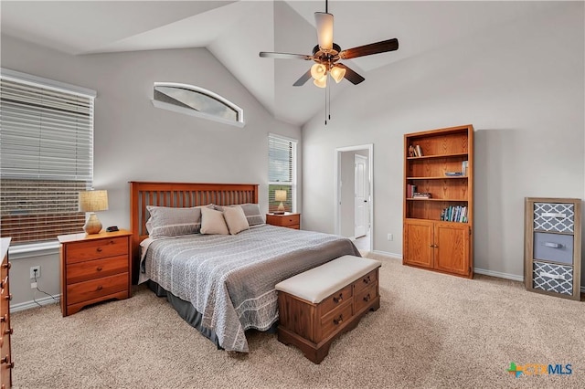 bedroom featuring high vaulted ceiling, light carpet, and ceiling fan