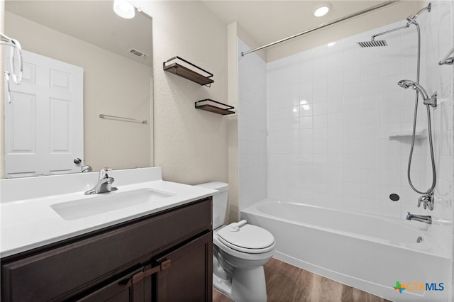 2503 Pintail Loop, Copperas Cove, TX 76522 - bathroom featuring wood finished floors, vanity, and  shower combination