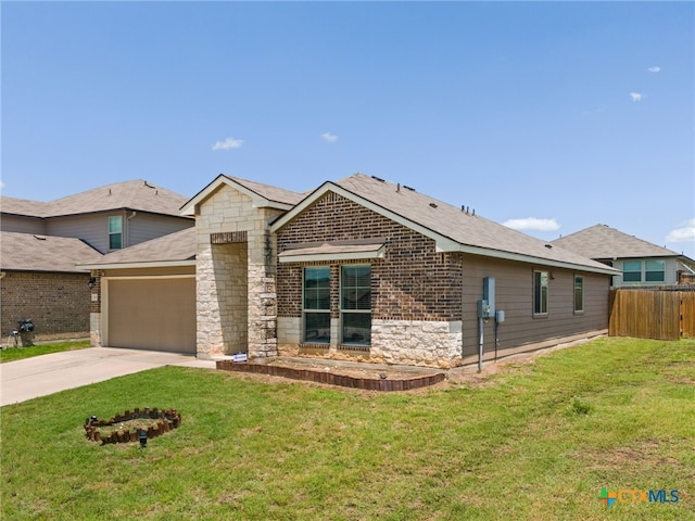 2503 Pintail Loop, Copperas Cove, TX 76522 - view of front facade with an attached garage, driveway, and stone siding