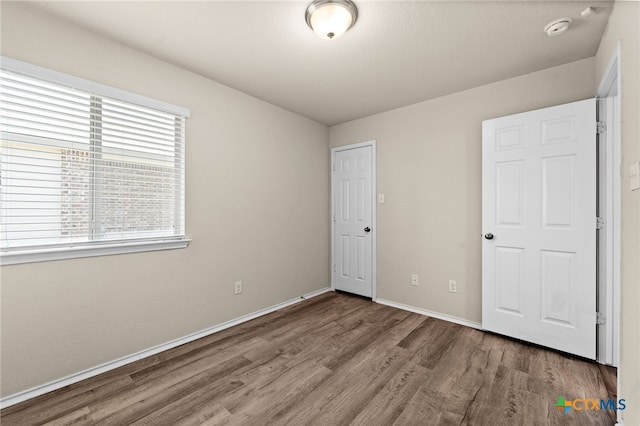 2503 Pintail Loop, Copperas Cove, TX 76522 - unfurnished bedroom with wood finished floors and baseboards