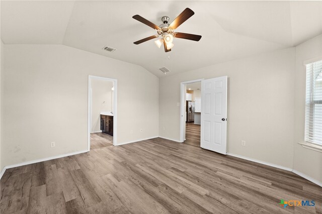 2503 Pintail Loop, Copperas Cove, TX 76522 - unfurnished room with lofted ceiling, ceiling fan, wood finished floors, and healthy amount of natural light