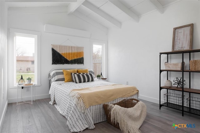 119 W Crockett St, Luling, TX 78648 - bedroom with baseboards and wood finished floors