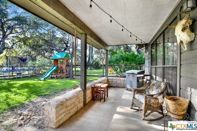 view of patio / terrace featuring a playground