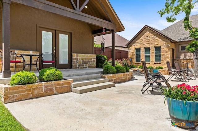 1605 Altavista Loop, Temple, TX 76502 - view of patio featuring french doors and fence