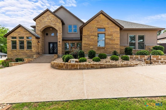 1605 Altavista Loop, Temple, TX 76502 - view of front of house with stone siding and stucco siding