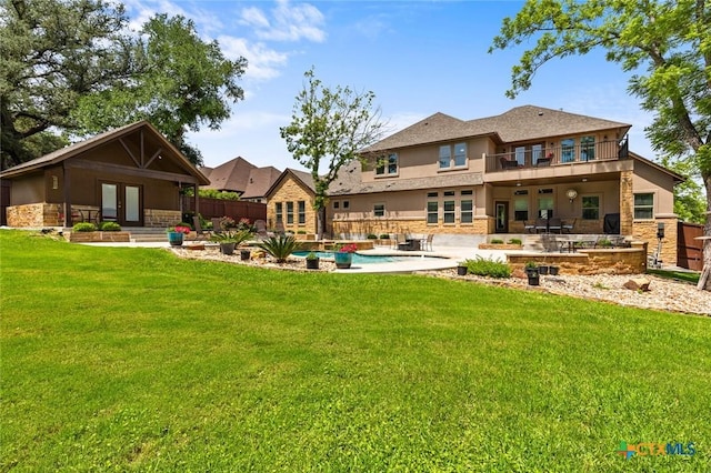 1605 Altavista Loop, Temple, TX 76502 - rear view of house featuring a balcony, french doors, a patio, stone siding, and stucco siding