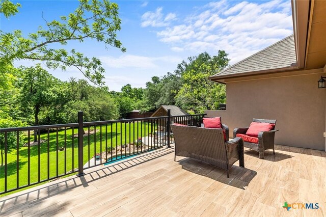 1605 Altavista Loop, Temple, TX 76502 - wooden deck with a yard
