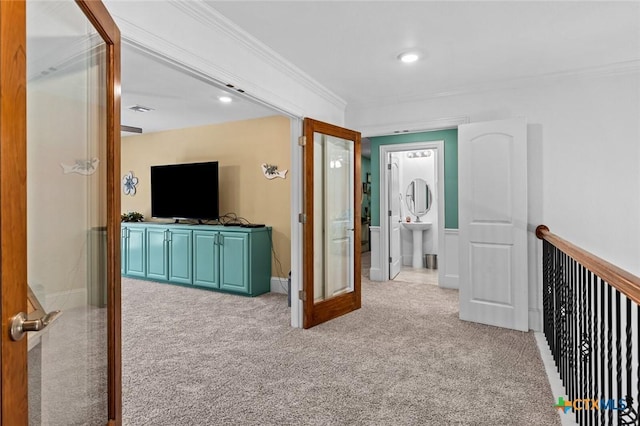 1605 Altavista Loop, Temple, TX 76502 - corridor featuring carpet floors, ornamental molding, recessed lighting, baseboards, and a sink