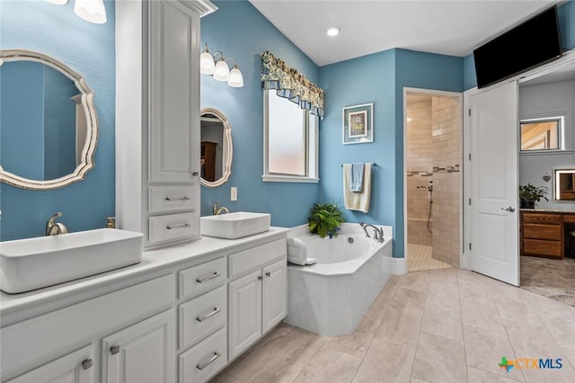 1605 Altavista Loop, Temple, TX 76502 - full bath featuring a bath, plenty of natural light, a tile shower, double vanity, and recessed lighting