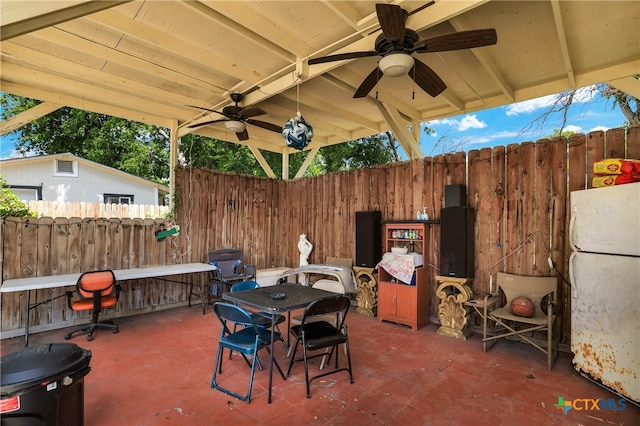 view of patio / terrace featuring ceiling fan