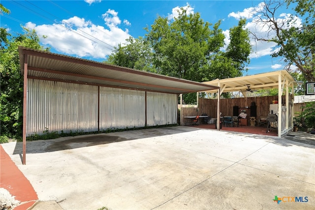 exterior space with ceiling fan