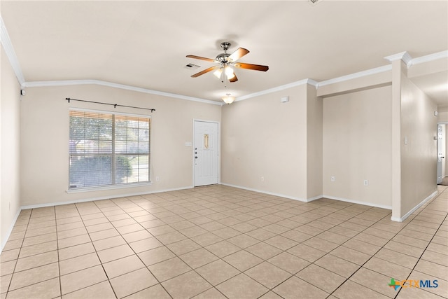 empty room featuring baseboards, ornamental molding, visible vents, and a ceiling fan