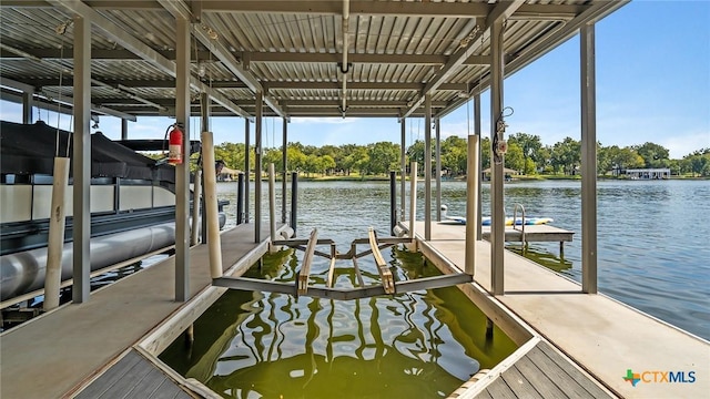 dock area featuring a water view