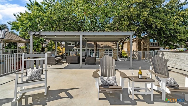 view of patio / terrace featuring outdoor lounge area and a gazebo