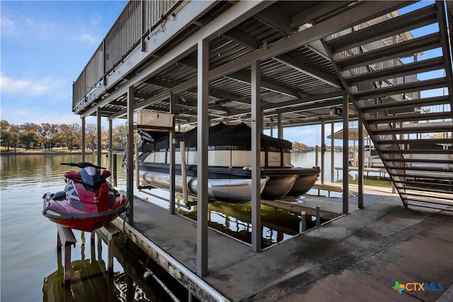 view of dock with a water view