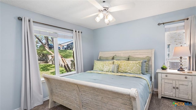 carpeted bedroom featuring ceiling fan