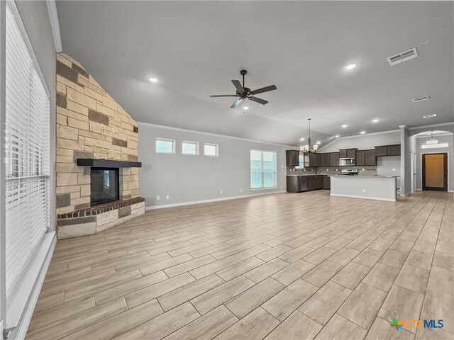 5205 Colina Dr, Killeen, TX 76549 - unfurnished living room featuring crown molding, a ceiling fan, a fireplace, recessed lighting, and baseboards
