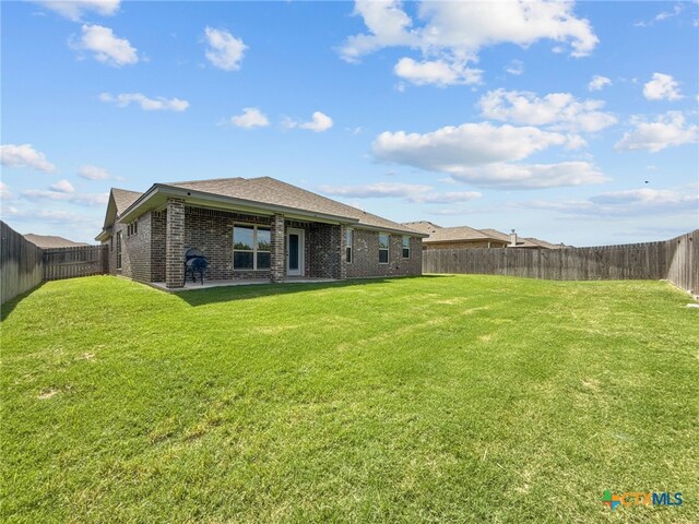 5205 Colina Dr, Killeen, TX 76549 - rear view of house with brick siding and a shingled roof