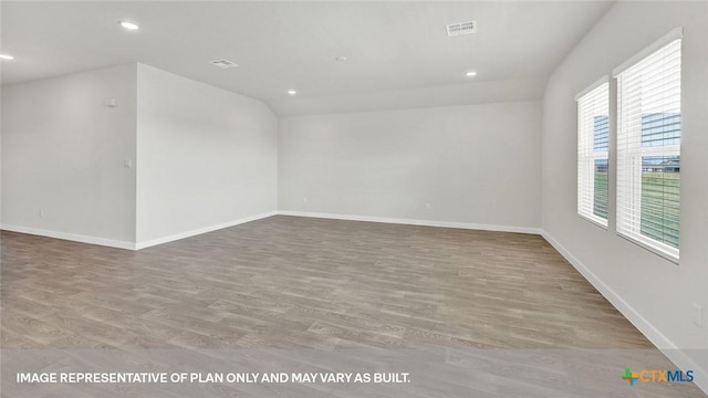 empty room featuring light hardwood / wood-style floors