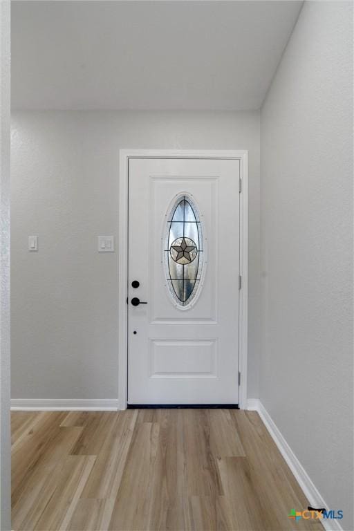 foyer with light hardwood / wood-style flooring