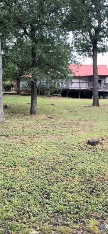 501 Live Oak St, Gatesville, TX 76528 - view of green lawn featuring a deck