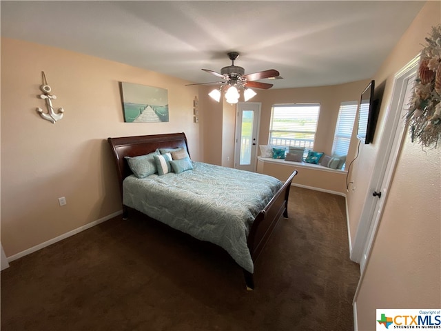 bedroom with ceiling fan and dark colored carpet