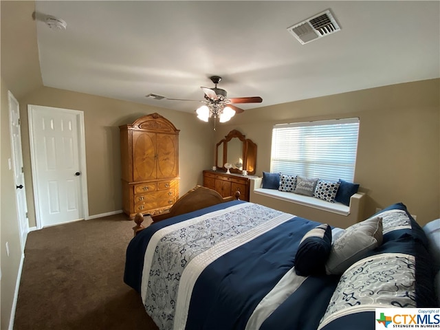 bedroom with ceiling fan and carpet