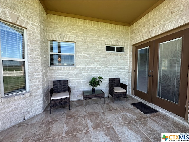 view of patio featuring french doors