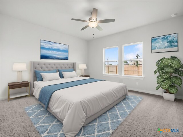 1513 Passmore Downs, New Braunfels, TX 78130 - bedroom featuring carpet flooring, baseboards, and ceiling fan