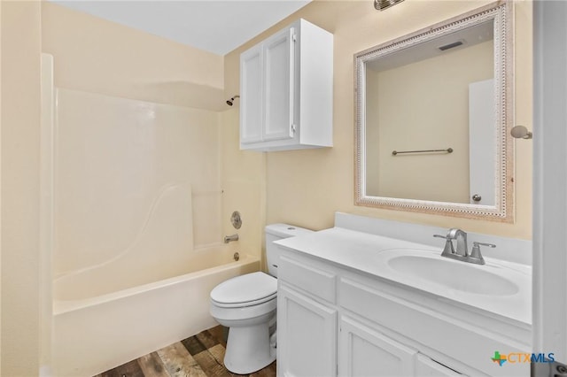 501 Appaloosa Dr, Victoria, TX 77904 - full bath featuring vanity, wood finished floors, and shower / washtub combination