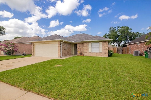 501 Appaloosa Dr, Victoria, TX 77904 - ranch-style home with brick siding, an attached garage, and driveway