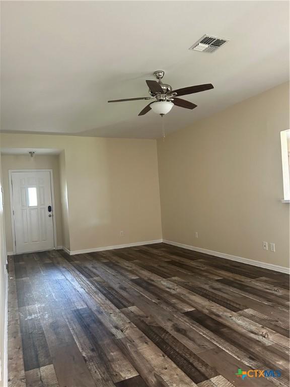 501 Appaloosa Dr, Victoria, TX 77904 - empty room featuring dark wood-style flooring and ceiling fan