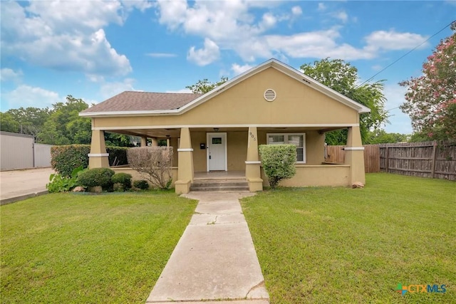 905 N Navarro St, Victoria, TX 77901 - view of front of house featuring stucco siding and covered porch