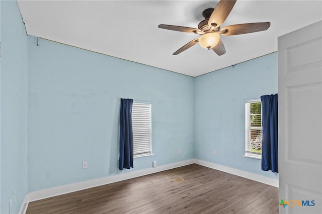 905 N Navarro St, Victoria, TX 77901 - empty room featuring a ceiling fan and wood finished floors