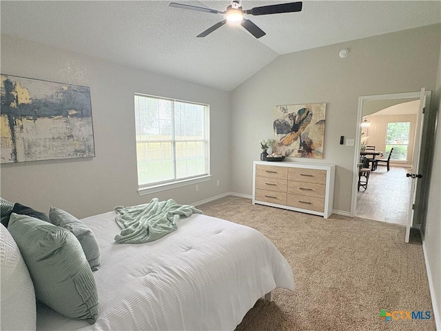 421 Arapaho Dr, Harker Heights, TX 76548 - bedroom featuring vaulted ceiling, light carpet, a ceiling fan, and baseboards