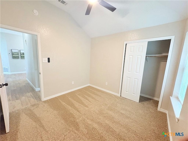 421 Arapaho Dr, Harker Heights, TX 76548 - unfurnished bedroom with vaulted ceiling, light colored carpet, baseboards, a closet, and a ceiling fan