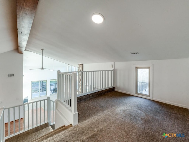 bonus room featuring vaulted ceiling with beams, baseboards, visible vents, and carpet flooring