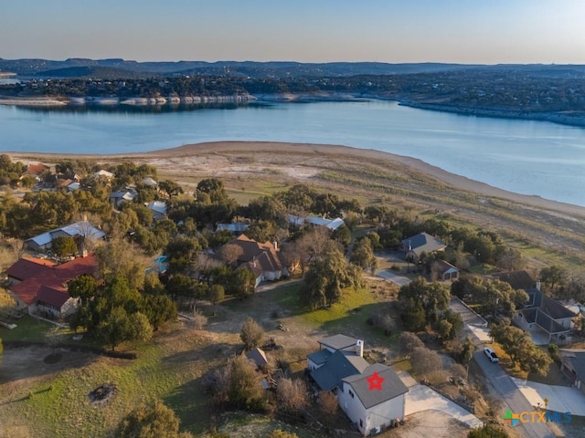 bird's eye view featuring a water and mountain view