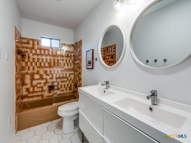 bathroom with  shower combination, double vanity, a sink, and toilet